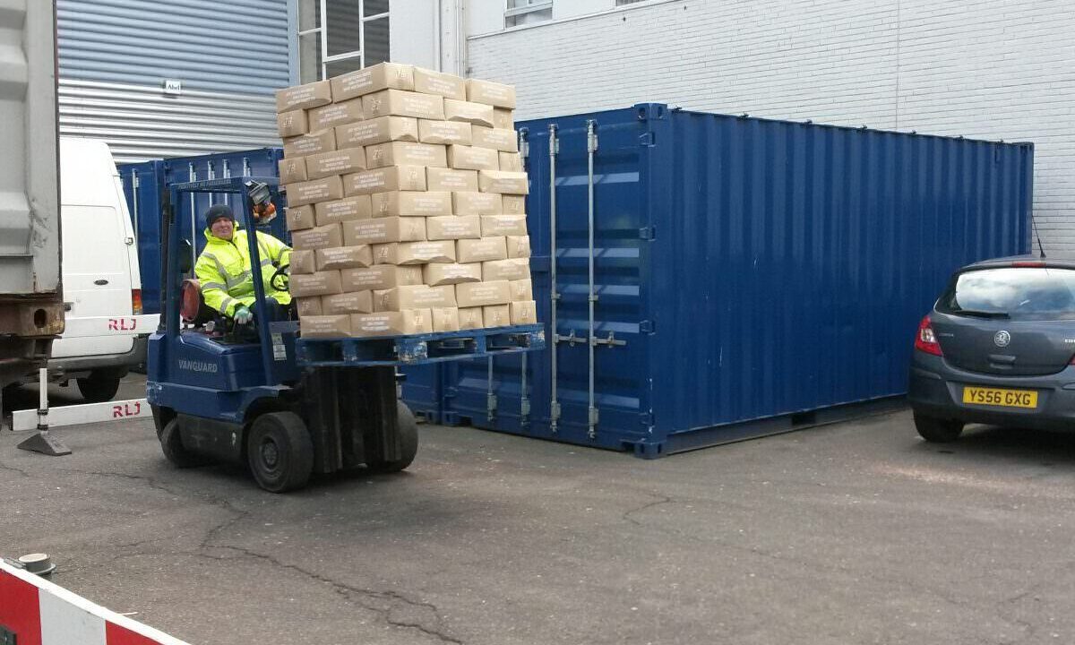 A photo showing a Vanguard employee moving some heaving materials with a forklift in one of the Vanguard Storage branches.