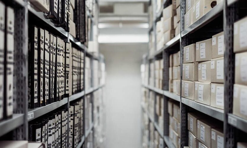 A photo showing many storage boxes and folders inside of an archive.