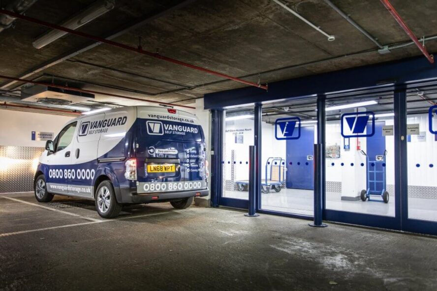 A photo showing the Vanguard van parked outside one of Vanguard's self storage branches.