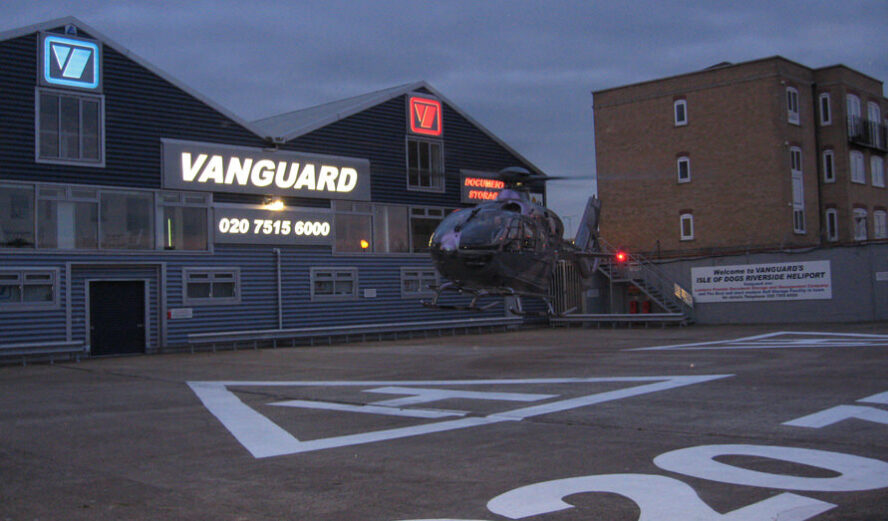 A photo showing Vanguard's helipad with an helicopter taking off.